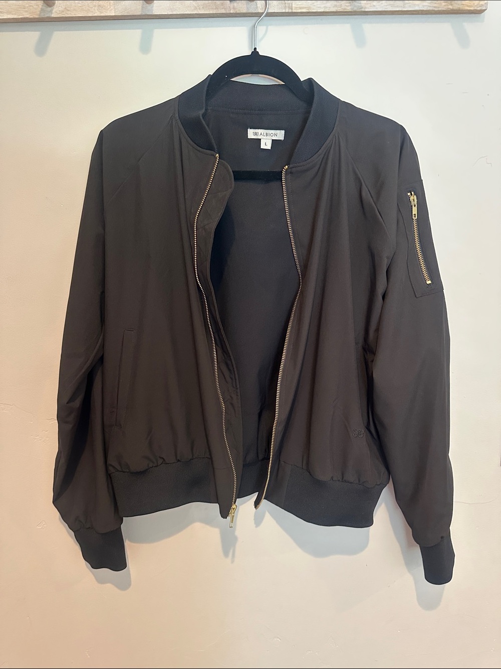Albion Black Jacket with Gold Zipper Accents